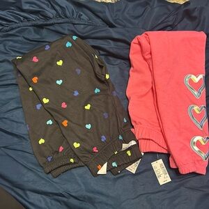 NWT- The Children’s place Girls Printed Fleece  joggers- 2 pair Size 7/8.